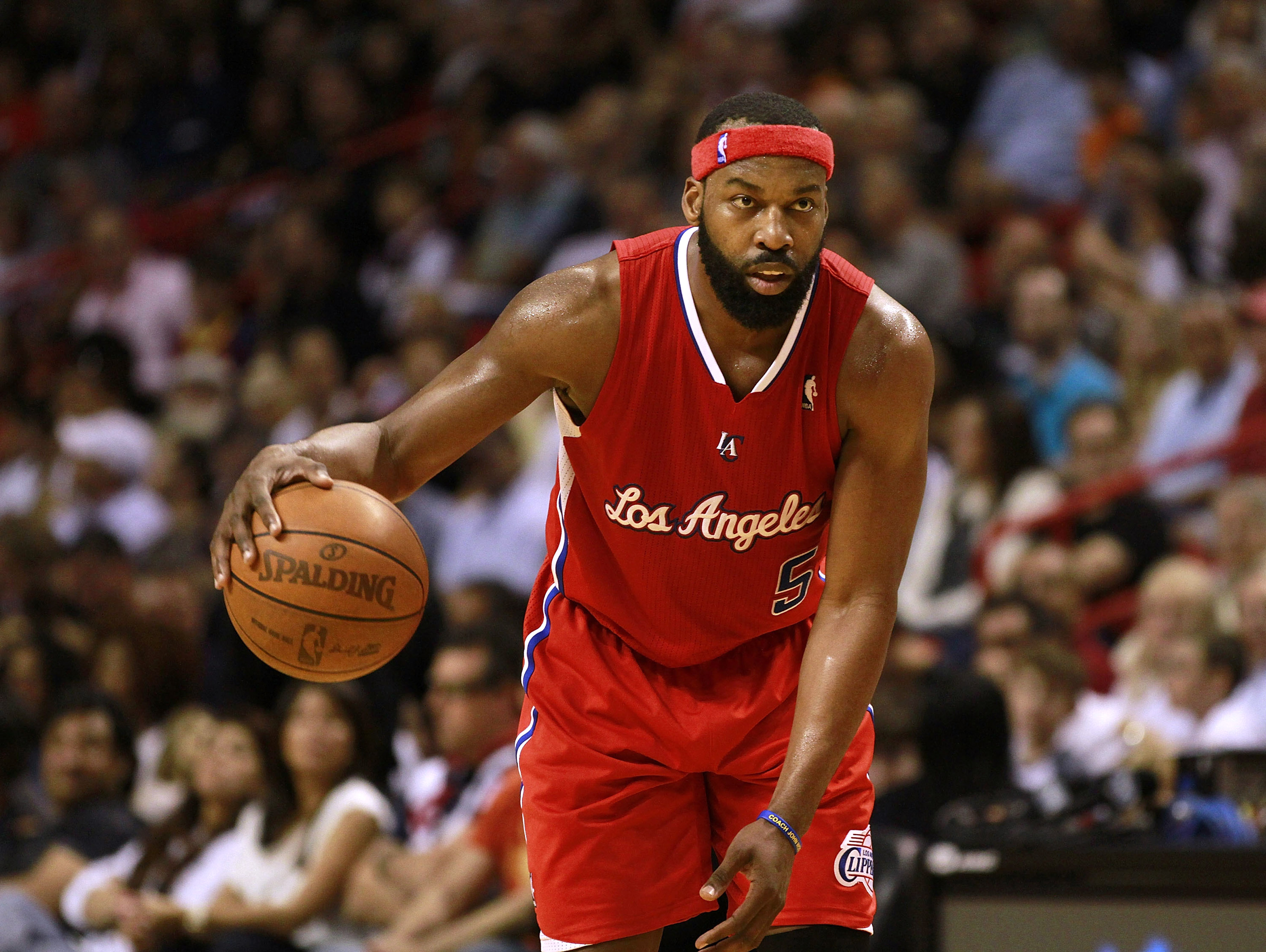 MIAMI - FEBRUARY 06: Guard Baron Davis of the Los Angeles Clippers drives against the Miami Heat at American Airlines Arena on February 6, 2011 in Miami, Florida. The Heat defeated the Clippers 97-79. NOTE TO USER: User expressly acknowledges and agrees that, by downloading and or using this photograph, User is consenting to the terms and conditions of the Getty Images License Agreement.  (Photo by Marc Serota/Getty Images)